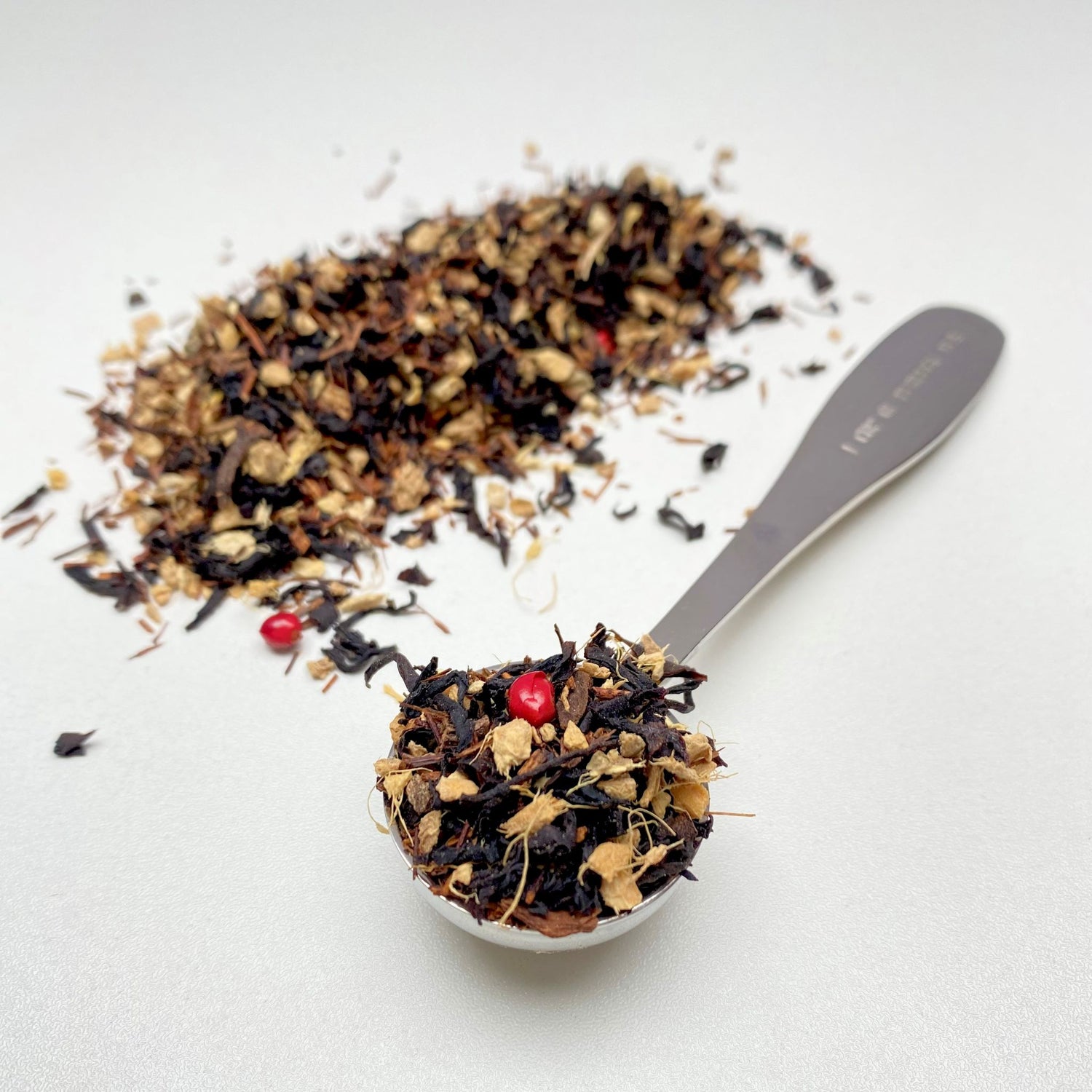 Dark and stormy tea teaspoon red peppercorns black tea ginger